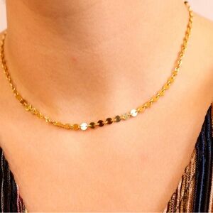 Gold disc choker from a small shop
